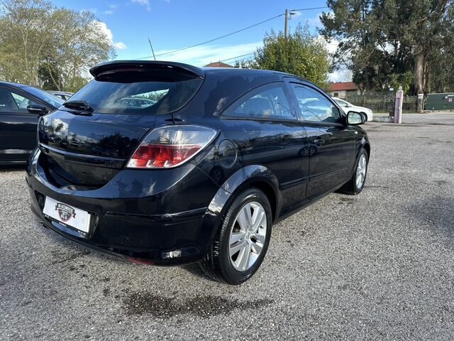 
								Opel Astra GTC total									