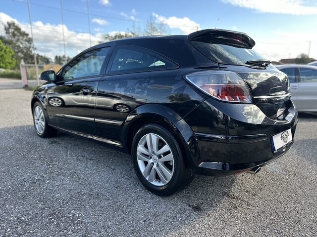 
								Opel Astra GTC total									