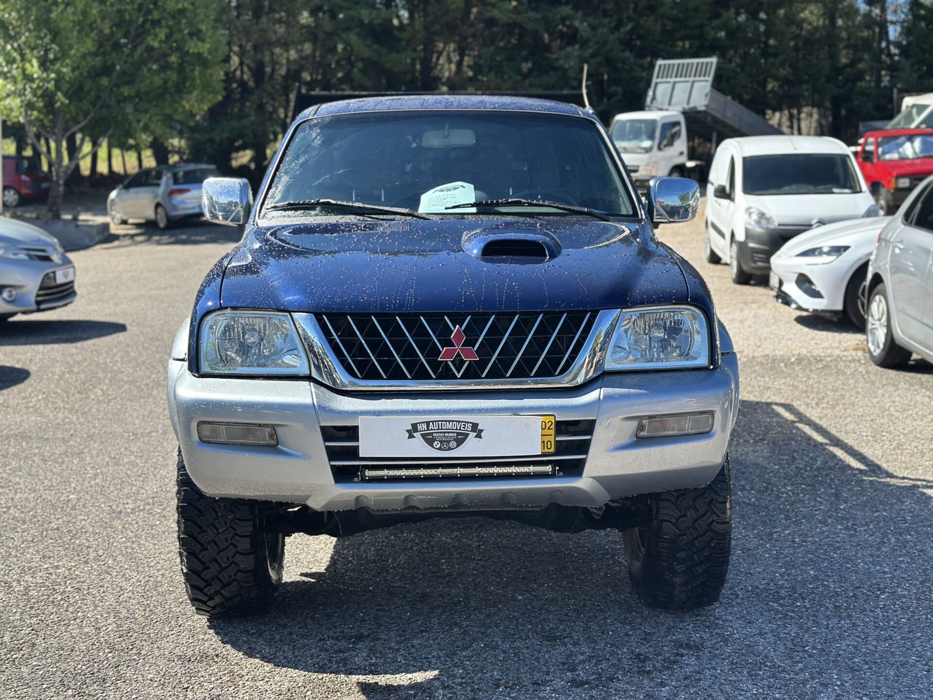 
								Mitsubishi L200 Strakar total									