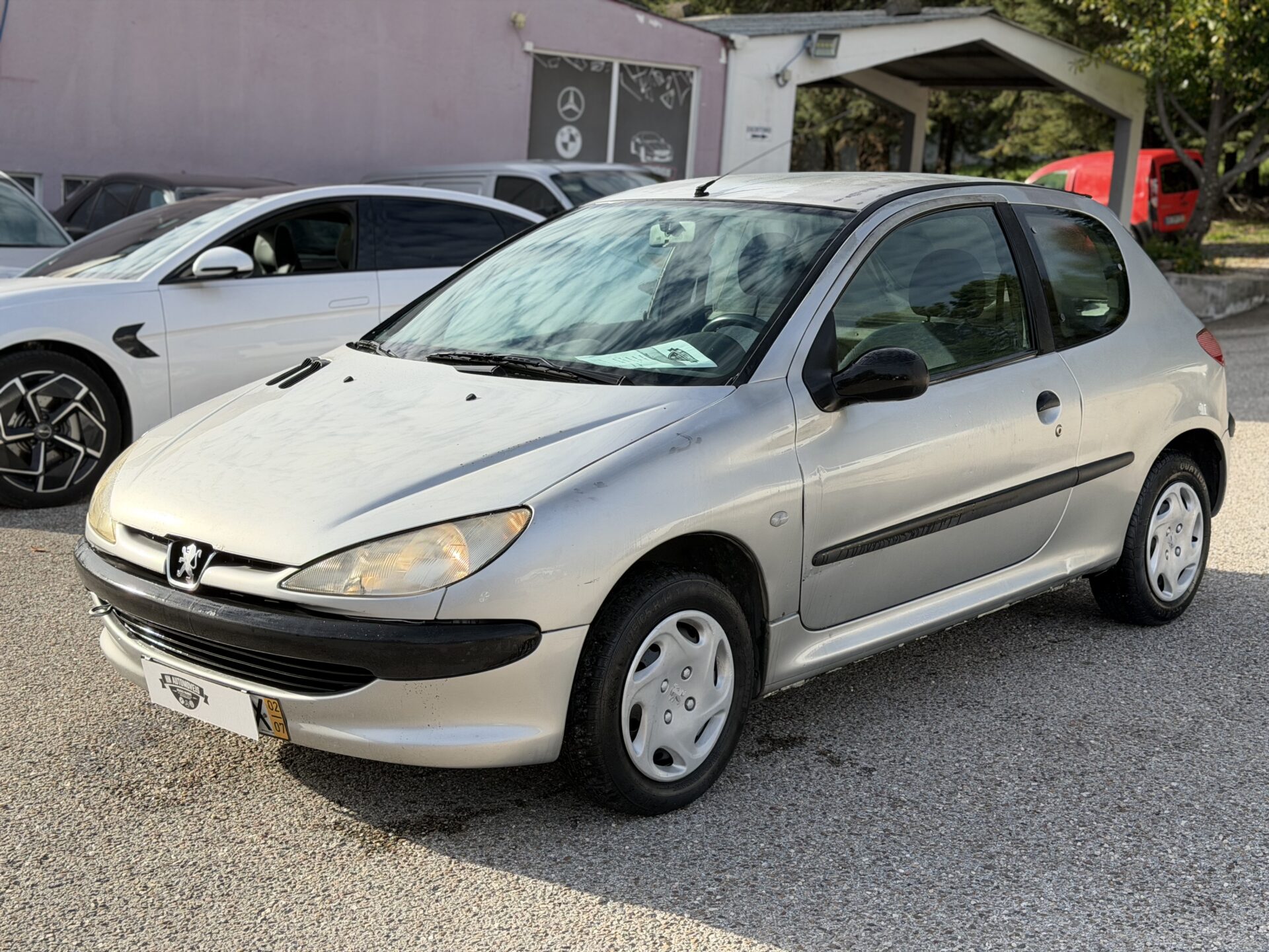 
								Peugeot 206 total									