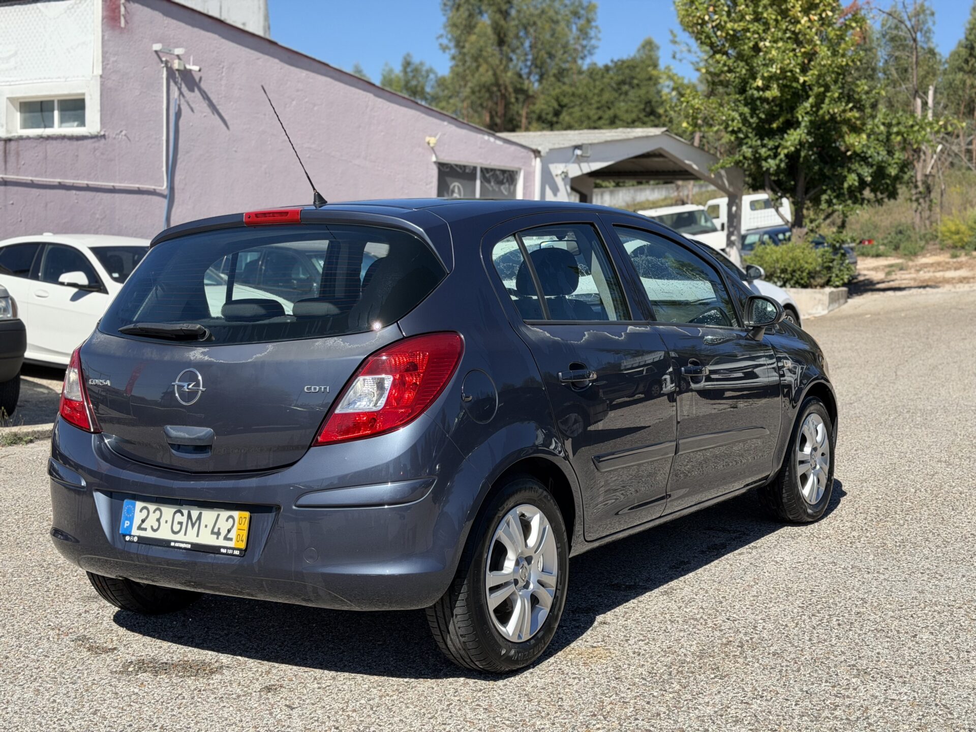 
								Opel Corsa total									